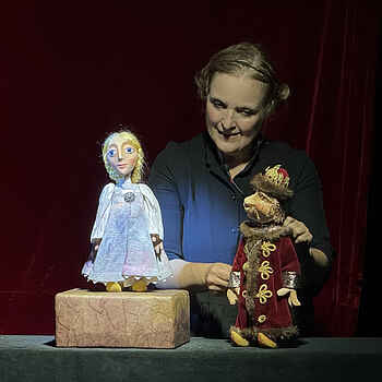 Die Puppe in der Tasche